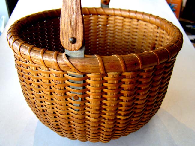 A wonderful Nantucket Lightship Basket "Made by Ferdinand Sylvaro, 97 Orange Street, Nantucket, Mass.", circa 1935
